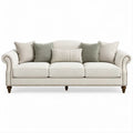 3-Sitzer-Sofa Cremeweiss mit salbeigrünen Kissen und dunkelbraunen Massivholzfüssen, 230 x 96 x 90 cm